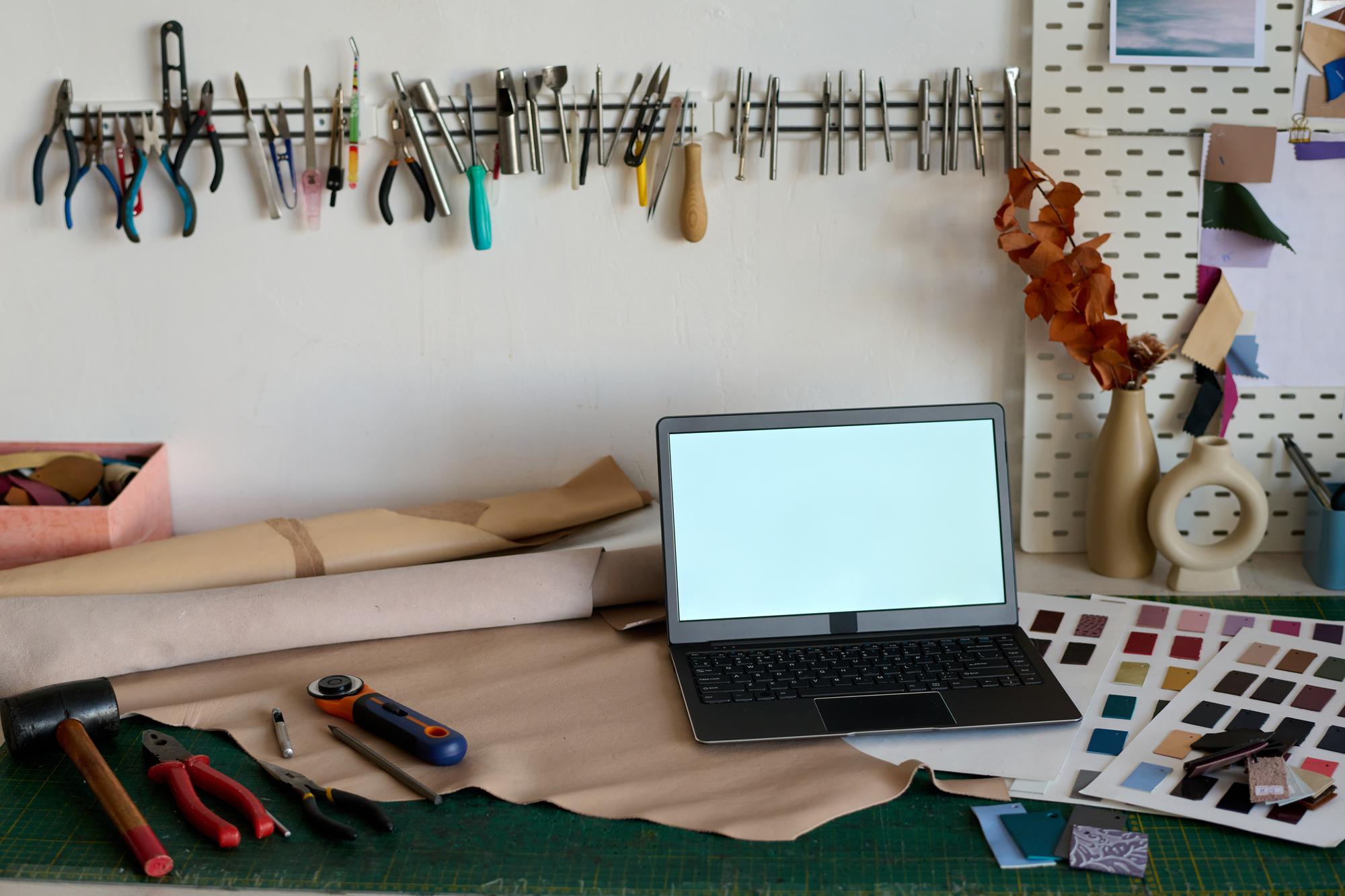 Studio workspace with embroidery tools